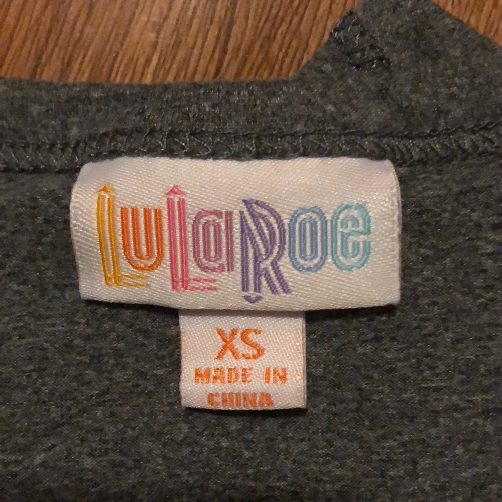 LulaRoe 1 pocket gray dress. Fits more like a MED